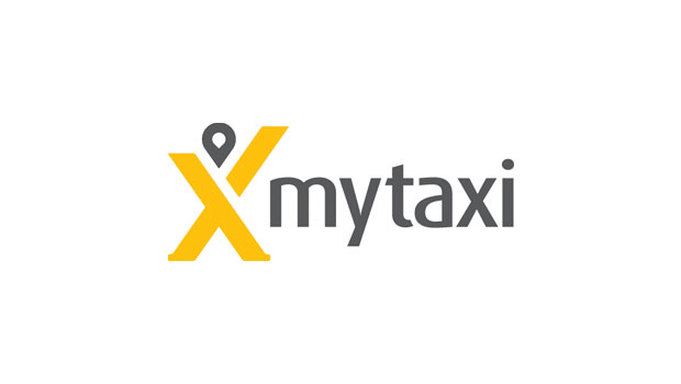 Logotipo "mytaxi" con una "X" amarilla y un pin de ubicación. Diseño moderno, simplicidad visual. Ideal para marketing de movilidad y transporte urbano.