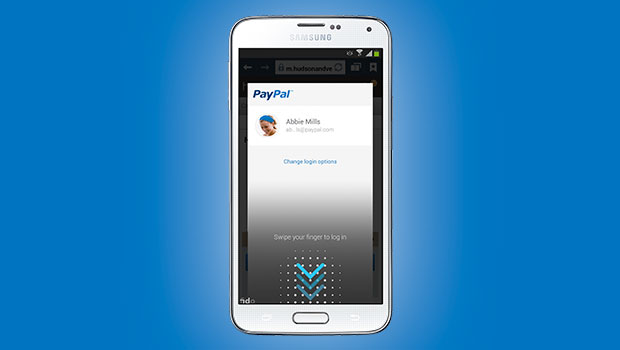 Teléfono Samsung muestra pantalla de inicio de sesión de PayPal con opción de deslizar el dedo para acceder. Fondo azul resalta. Tecnología segura.
