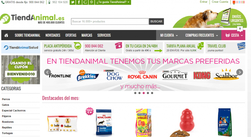 Página web de TiendAnimal; promoción de productos para mascotas, incluye marcas como Royal Canin y Kong. Texto: "EN TIENDANIMAL TENEMOS TUS MARCAS PREFERIDAS" y "USANDO EL CUPÓN BIENVENIDO10". Categorías: Perros, Gatos, etc.