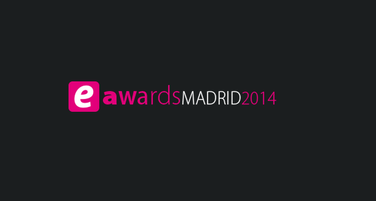 Logo "eawards MADRID 2014" en fondo negro, texto en rosa y blanco, relacionado con marketing y eventos de premiación digital.