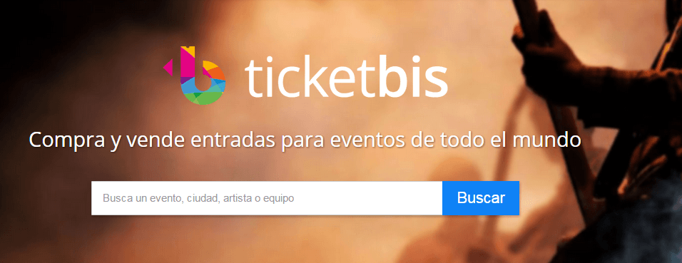 Logo de Ticketbis con texto "Compra y vende entradas para eventos de todo el mundo". Caja de búsqueda en primer plano; fondo de concierto.
