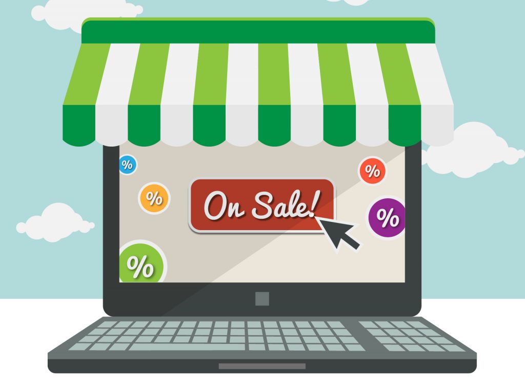 Portátil mostrando un botón rojo con texto "On Sale!" y un cursor apuntando; alrededor, símbolos de porcentaje de colores sobre fondo azul con nubes.