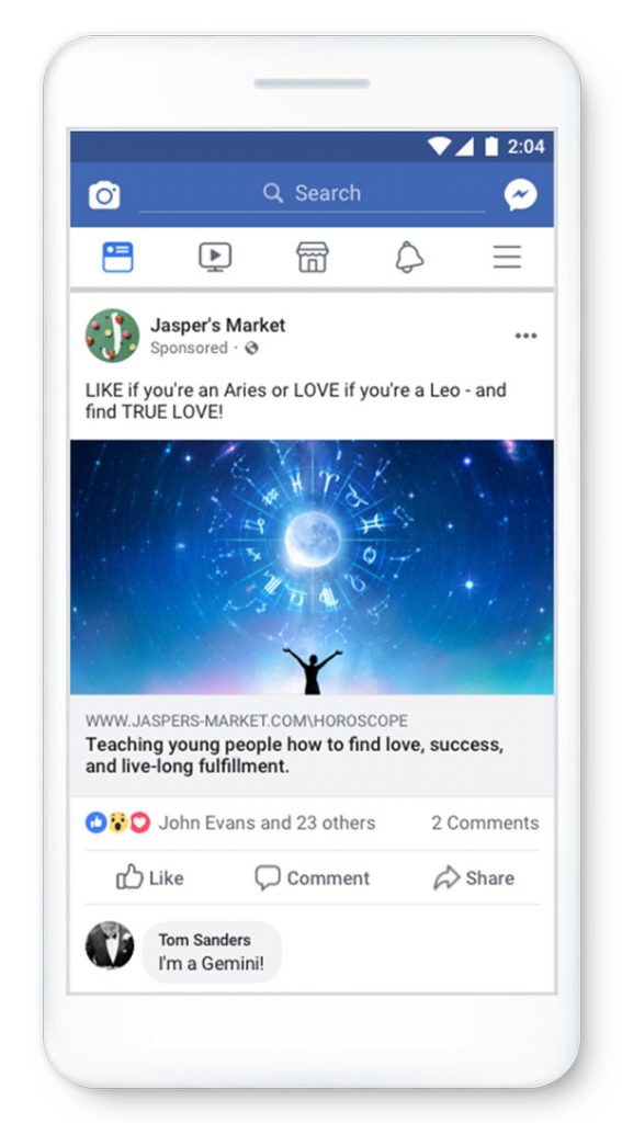 Tel&eacute;fono muestra una publicaci&oacute;n de Facebook de Jasper's Market. Imagen de una persona bajo un cielo estrellado con signos del zodiaco. Texto:   "LIKE if you're an Aries or LOVE if you're a Leo - and find TRUE LOVE! WWW.JASPERS-MARKET.COM/HOROSCOPE Teaching young people how to find love, success, and live-long fulfillment."  Comentario de Tom Sanders: "I'm a Gemini!".   Ideal para marketing digital, hor&oacute;scopos, amor, redes sociales.