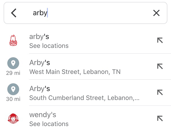 B&uacute;squeda de "arby's" en una aplicaci&oacute;n. Resultados muestran ubicaciones cercanas: "Arby's" en West Main Street y South Cumberland Street, Lebanon, TN. Tambi&eacute;n aparece "wendy's".