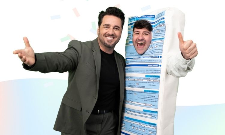 david bustamante abrazando a una mascota de tax down